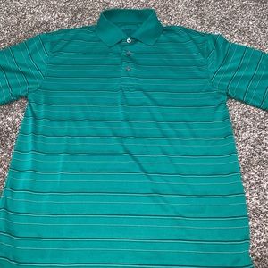 Small PGA golf polo but it fits like a medium.